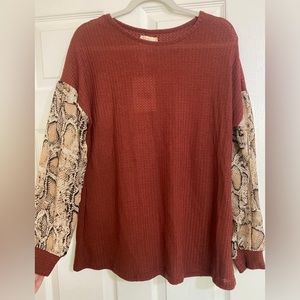 Rust and snakeskin blouse size small NWT